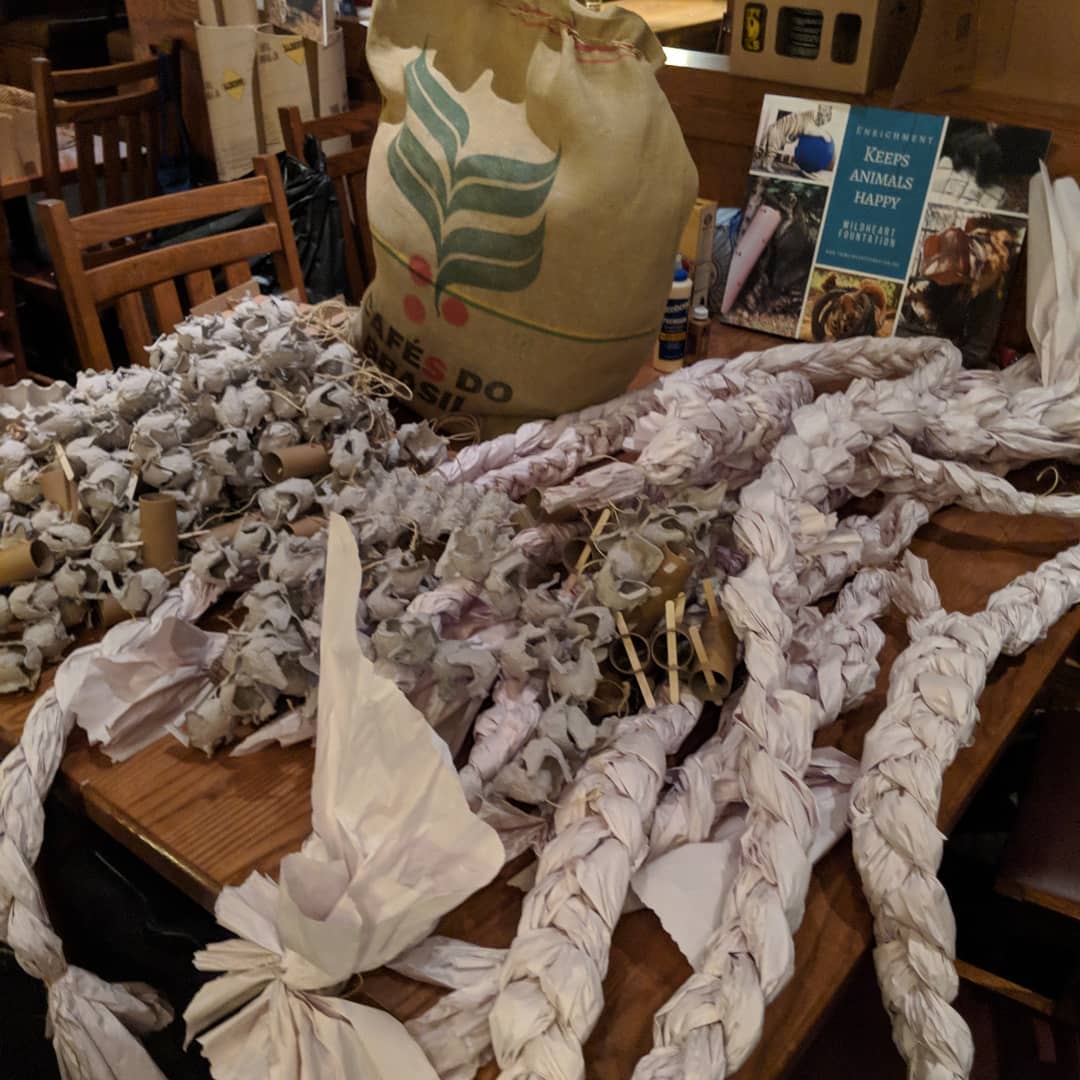 A pile of animal toys made from braided paper ropes
